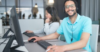 a man and a woman working in a call center
