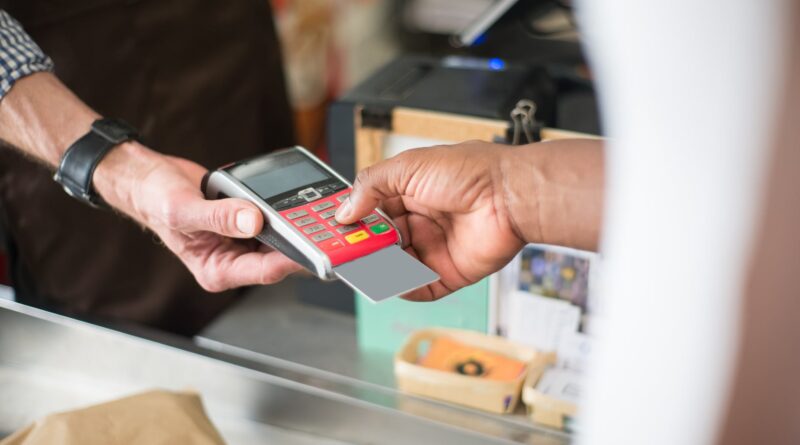 a person paying with a bank card